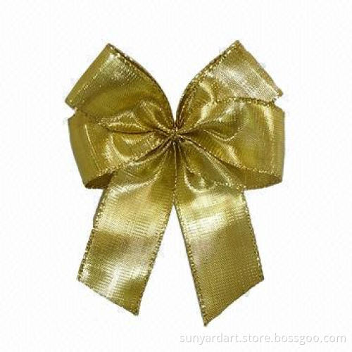 Metallic ribbon gift bow with adhesive tab at back